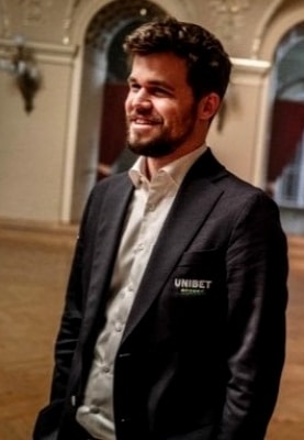 Magnus Carlsen wins 2022 Tour with event to spare after storming into Aimchess Rapid semifinal