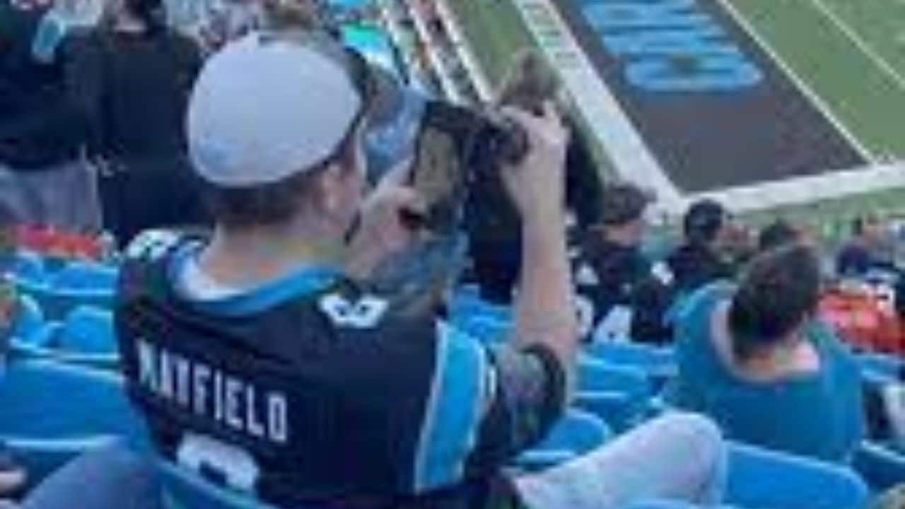 Watch Panthers Fan Uses Binoculars On Phone To Record Cheerleaders, Video Goes Viral