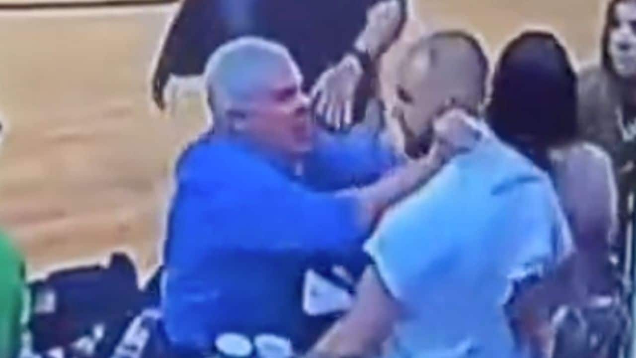 Watch Tom Rife Virginia Girls high school basketball grabs and shoves fan in stands, video of fight goes viral