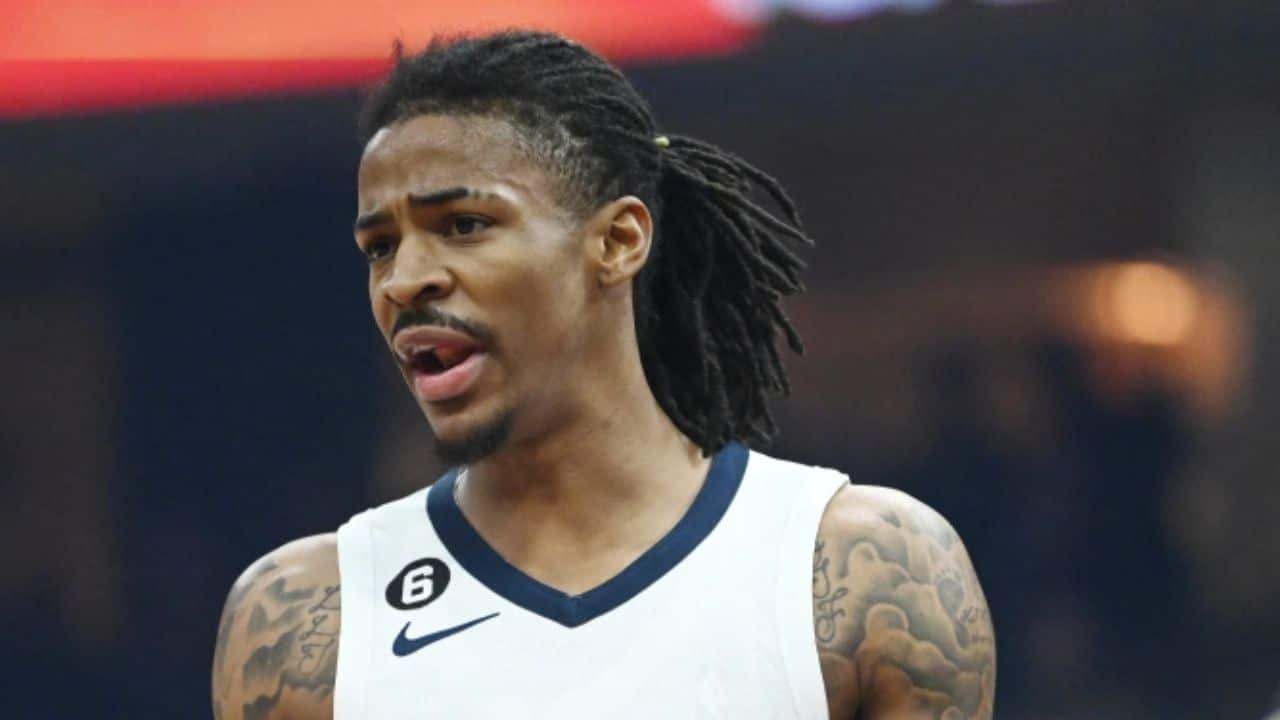Watch Ja Morant celebrates by making gun signs during NBA game before hopping on Instagram live to show off real weapon in viral video